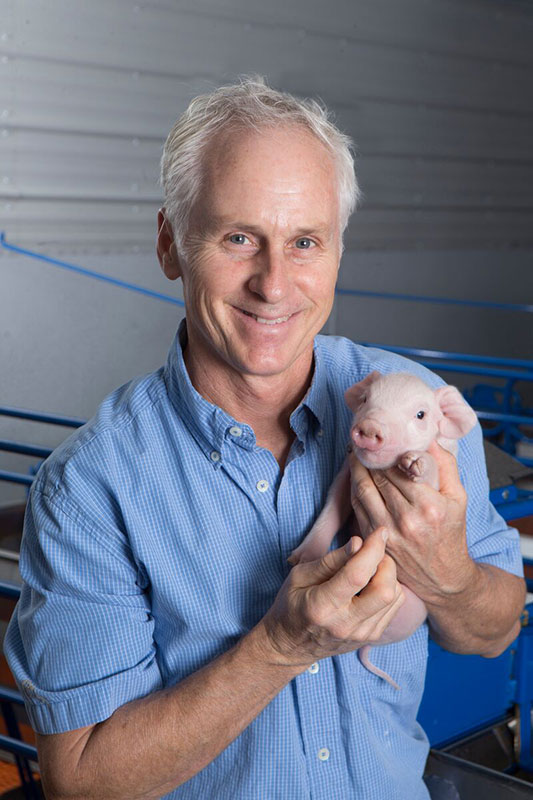 0 Patrick Bane with Pig 0 web